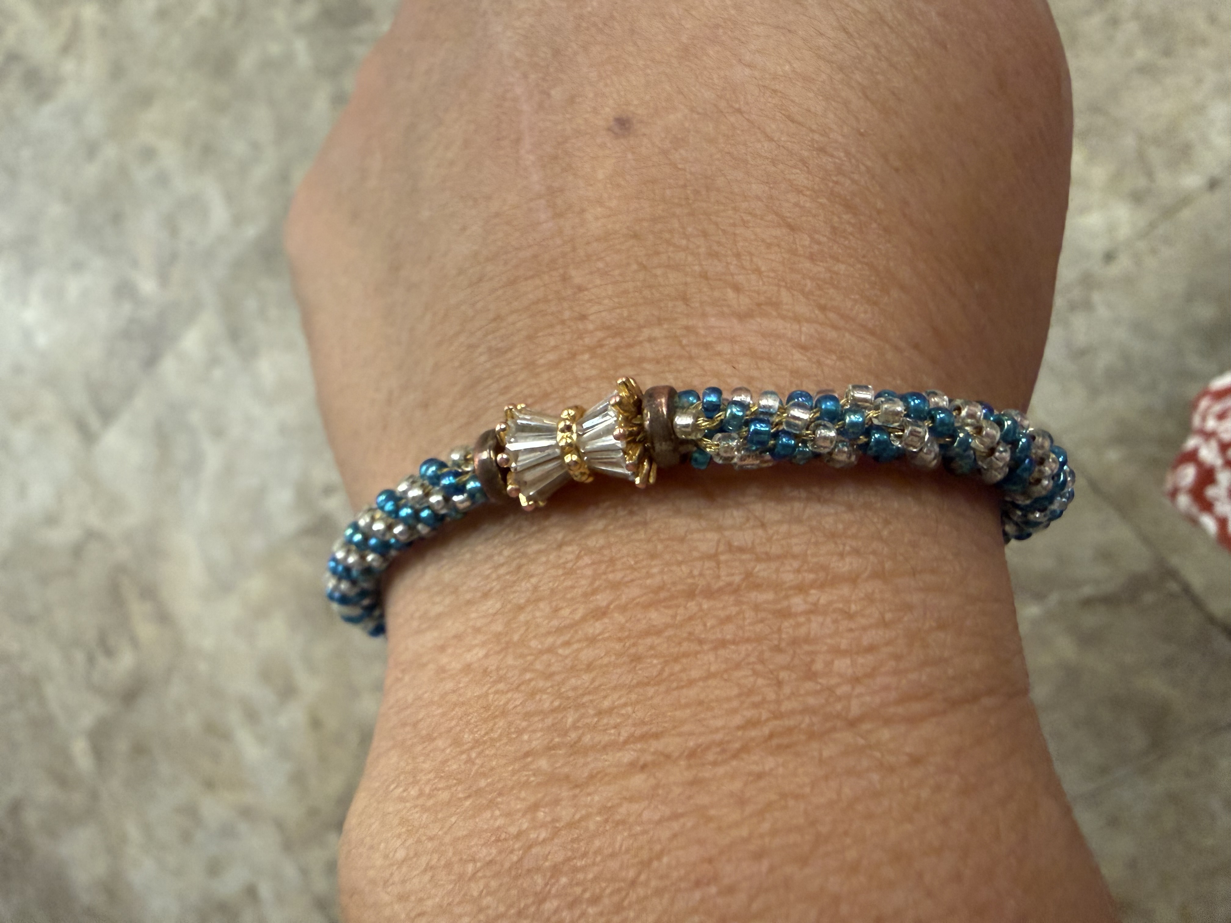 Teal Kumihimo Bracelet with Cross & Heart Charm detail
